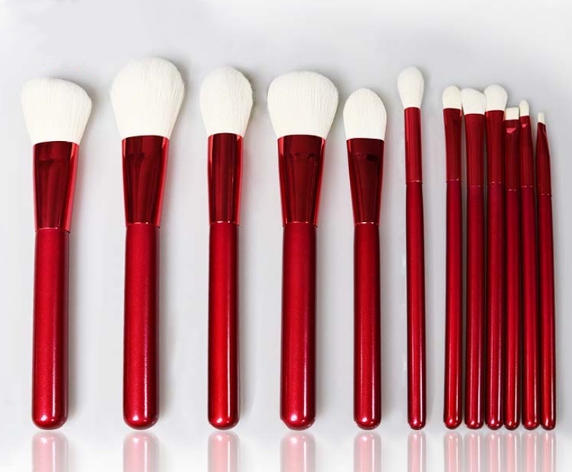 red makeup brush
